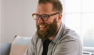 Editor Ben Corfield signs with Papercut
