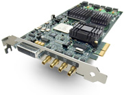 An electronic circuit board with heat sinks and multiple gold-plated connection ports.