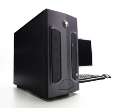 A large black desktop computer tower positioned next to a monitor, keyboard, and mouse on a white surface.