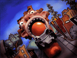 A red, stylized monster with large eyes and an open mouth holding a large orange ball in a cartoon town.