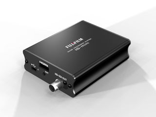 A black rectangular Fujifilm HS-MINI video processor with various input and output ports.