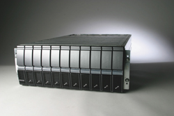 A large, dark grey rectangular server chassis with multiple vertical modular components.