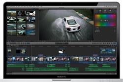 A laptop screen showing a video editing interface with a white car driving through water in the preview window.