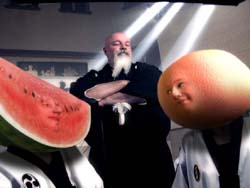 A man with a white beard stands behind two people with watermelon and grapefruit heads.